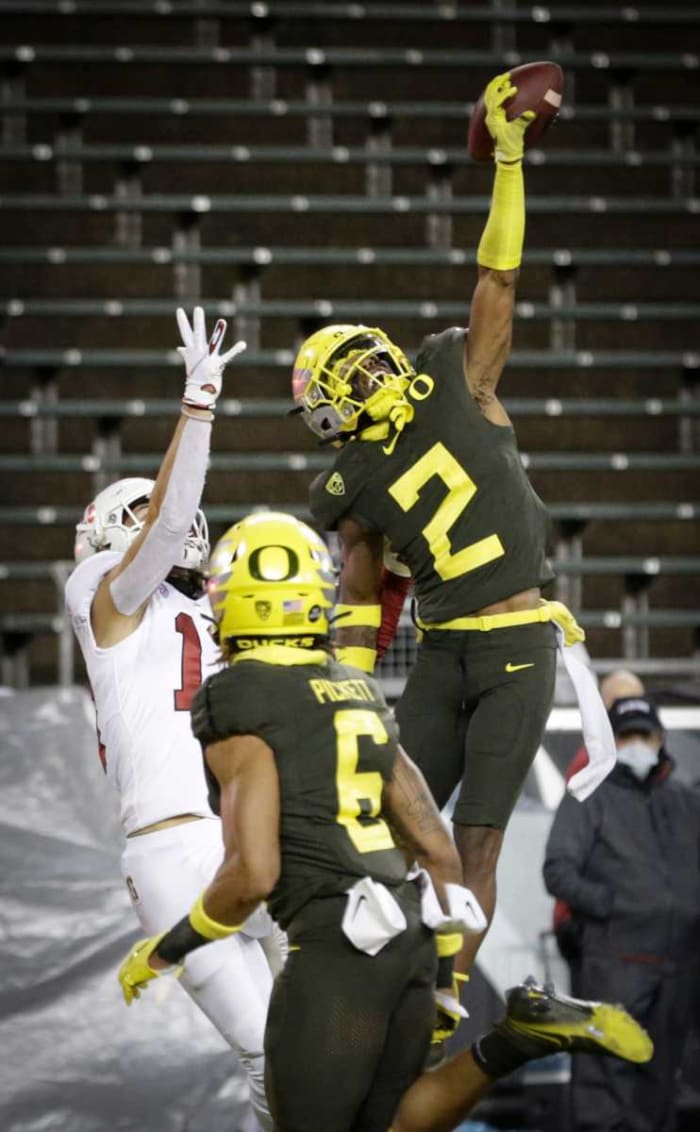 Mykael Wright (2), breaks up a touchdown pass intended for Stanford's Simi Fehoko (13) at Autzen Stadium in Eugene, Oregon on November 7, 2020.